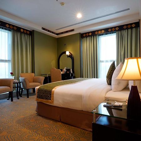 Awaliv International Hotel Ta'if Szoba fotó A bedroom at the hotel