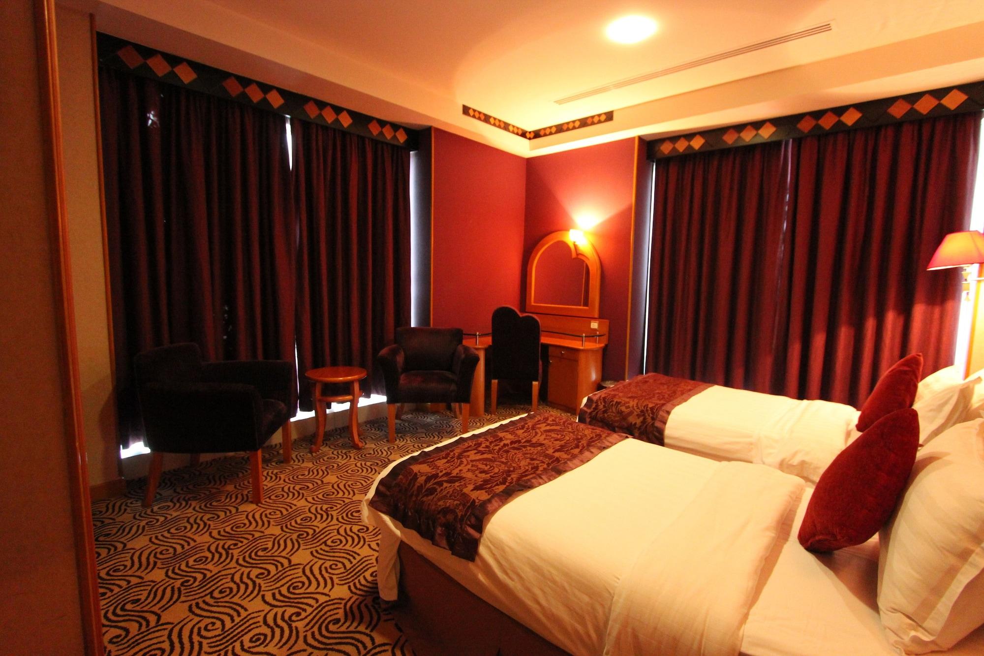 Awaliv International Hotel Ta'if Kültér fotó A room at the hotel